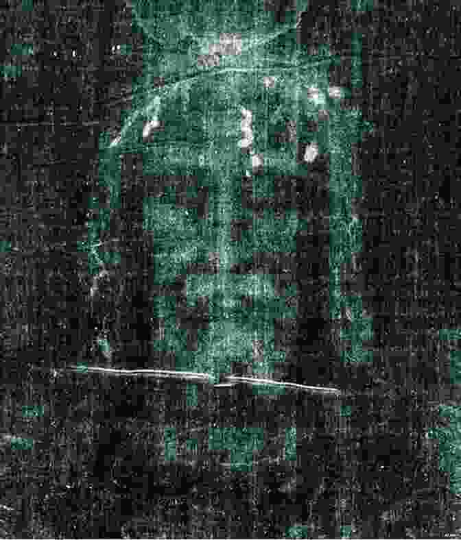 A Black And White Photograph Of The Shroud Of Turin, Depicting The Image Of A Man With Apparent Wounds On His Body, Wrapped In A Cloth. The Hidden History Of The Shroud Of Turin