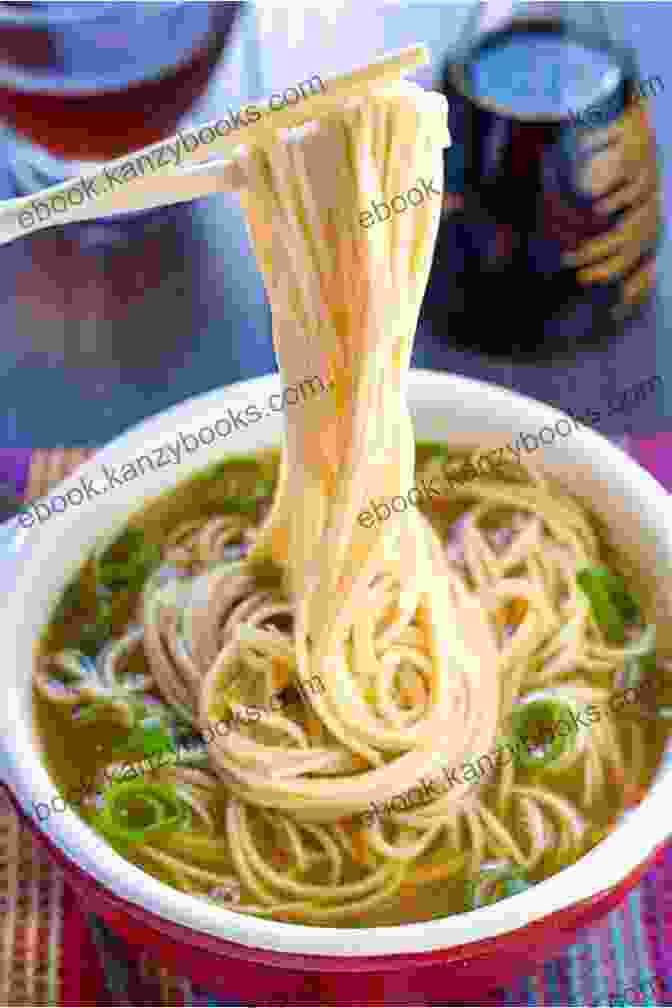 A Steaming Bowl Of Golden Chicken Noodle Soup, Garnished With Fresh Herbs The New Southern Cookbook: Classic Family Recipes And Modern Twists On Old Favorites